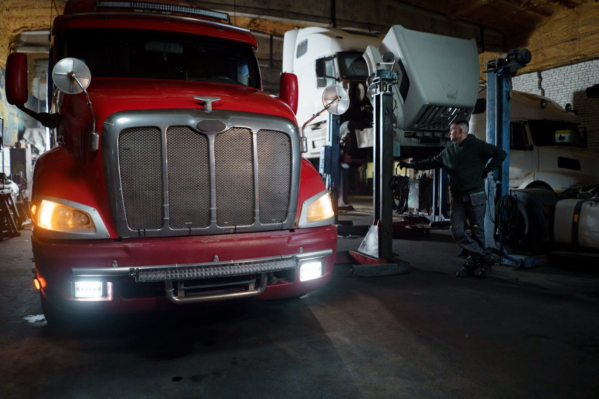 Red Peterbilt inside repair shop